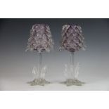A pair of John Walsh glass tree vases, with amethyst glass body and clear glass detail, (as found),