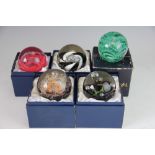 A collection of five Scottish glass paper weights,