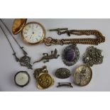 A selection of silver jewellery to include; a silver oval locket with basket detail,