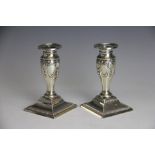 A pair of Edwardian silver candlesticks, Sheffield 1904,