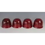 A set of four Victorian ruby glass light shades, 7cm, with two frosted and cut glass pointed shades,