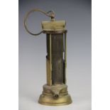 A 19th century 'Newcastle' brass miners davy lamp, with gauze centre,