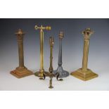 Two brass Corinthian column table lamps, tallest 35cm, with a fluted lamp,