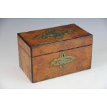 A Victorian walnut tea caddy, with two cannisters internally with domed tops,