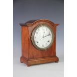 An American mahogany eight day mantel clock, with enamel Arabic dial and Sessions Clock Co movement,