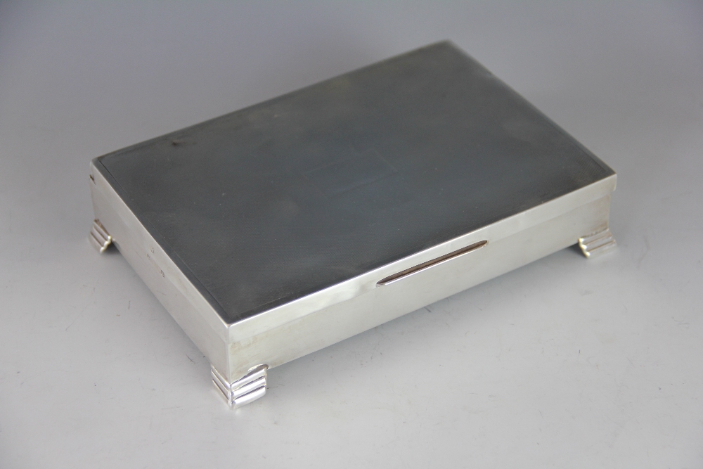 A rectangular silver cigarette box, Viner's Ltd, Sheffield 1959,