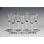 A collection of seven late 19th century glass drinking glasses, of 18th century design,