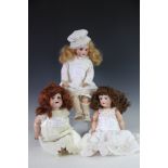 An Armand Marseille 390 head doll, with sleeping blue eyes and open mouth,