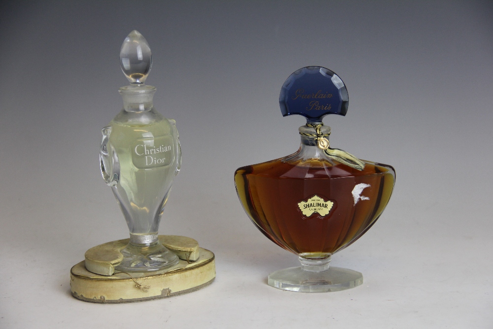 A graduated set of four Lalique for Nina glass scent bottles, to include a large display example, - Image 2 of 2