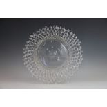 An early 19th century clear glass lattice dish, ground pontil mark, with four tier rim,