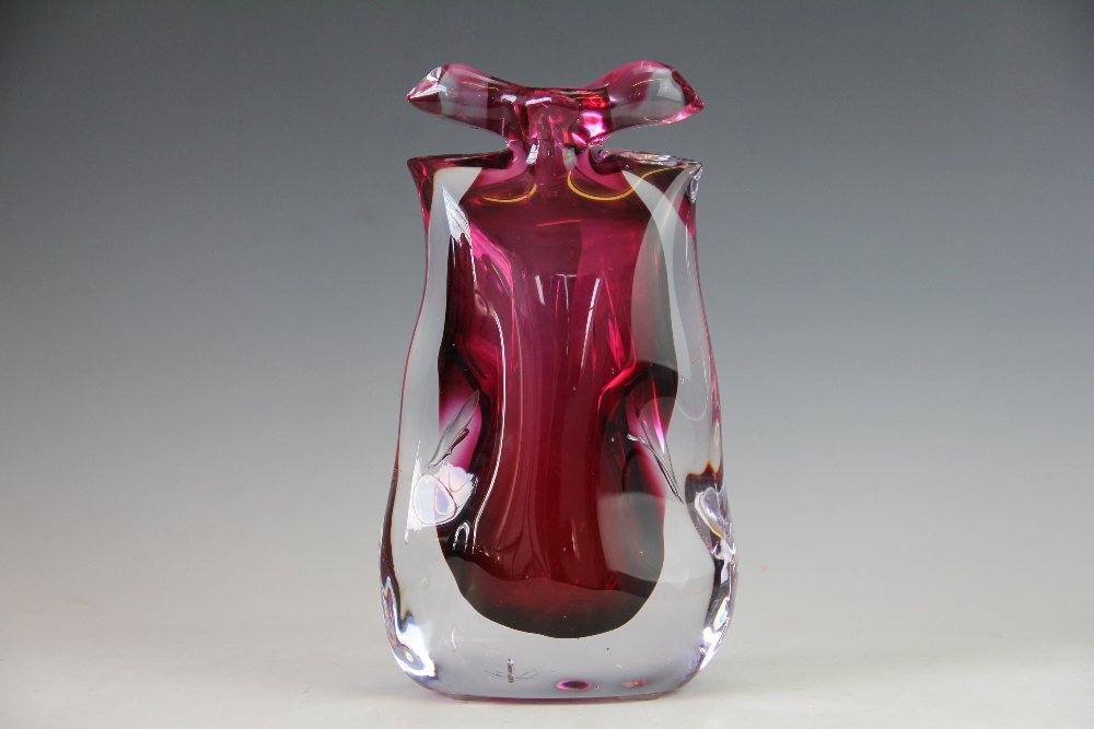 A large contemporary glass vase by Adam Aaronson vase, the ruby body encased in clear glass, signed,