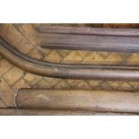 Two large sections of oak country house banister hand rails, largest 216cm,