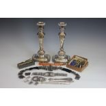 A pair of silver plated candlesticks, 19th century, 32.