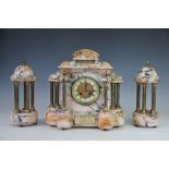 A late 19th century marble and gilt metal clock garniture, of architectural form,