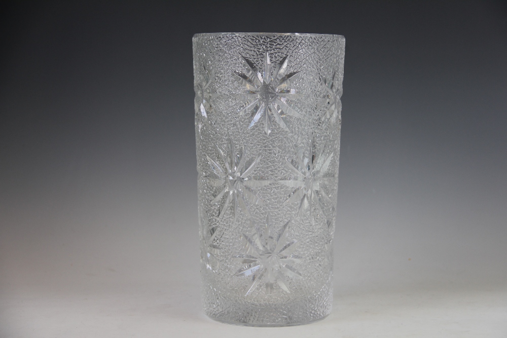 A Czechoslovakian clear glass tapering cylindrical vase, with star crackled ice detailing, 29.