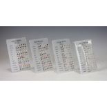 Four Perspex stands containing a quantity of 'Austrian Crystal Sterling Silver' ear studs