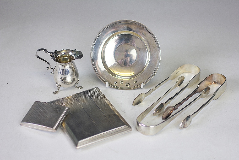 A selection of silver to include a silver Edward VII milk jug, S&Co Birmingham 1901,