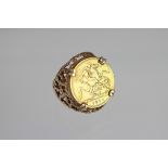 A Victorian gold half sovereign set ring dated 1894,