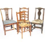 A George III oak chair, with rustic repairs, a George III oak dining chair, with drop in seat,