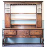 A George III inlaid oak high back dresser,