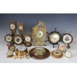 A collection of Victorian and later barometers and time pieces,