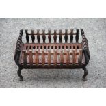 A cast iron fire basket,