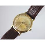 A yellow gold gents Omega Seamaster, Automatic wristwatch, the silvered dial with batons,