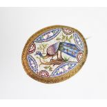 A micro mosaic brooch, the 19th century oval brooch depicting a peacock perched on a branch,