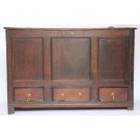 An 18th century and later oak mule chest, with hinged top above three drawers, on plinth base,