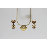 A diamond set pendant, the brilliant cut diamond with 18ct yellow gold,