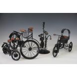 Two modern miniature metal bicycles,