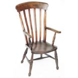 A 19th century beech and ash country kitchen chair, with saddle seat,