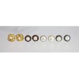A collection of assorted earrings,