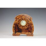 An Arts and Crafts style poker work mantel time piece, decorated with an owl above an oak tree,