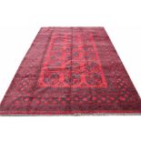 An Afghan wool carpet,