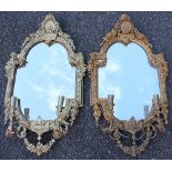 A pair of Victorian gilt wood and gesso twin branch girandoles,