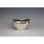 A two handled silver sugar bowl, John Round & Sons, Sheffield 1912, of cusped form, 9.