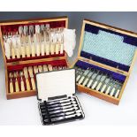 A mahogany case containing a set of twelve EPNS fish knives and forks,