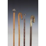 An Edwardian silver mounted bamboo walking cane, with foliate ball handle, 95cm,