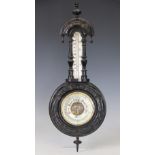 A Victorian ebonised aneroid barometer, with thermomenter, retailed by Blair & Co Cardiff and Barry,