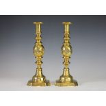 A pair of Victorian brass 'Good Luck' candlesticks,