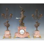 A late 19th century French gilt spelter clock garniture,