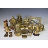 A collection of assorted brass wares to a tray,