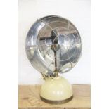 A vintage paraffin tilly type heater, of retro style with circular upper section,