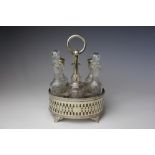 A Victorian six bottle cruet within silver plated stand,