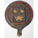 A Notts and Derbys cast iron fire insurance badge, cast verso 'Made in England' Salop Iron 1897,