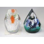 Two Caithness Glass paperweights designed by Sarah Peterson and cut by Martin Murray,