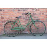 A vintage Hercules Lady's loop frame bicycle,