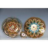 Two Studio Cellini, Pesaro, enamelled bowls, and a snail shaped pin dish,