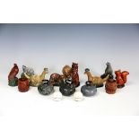 A collection of Beswick spirit flasks, to include; Loch Ness, three curling stones, a squirrel,